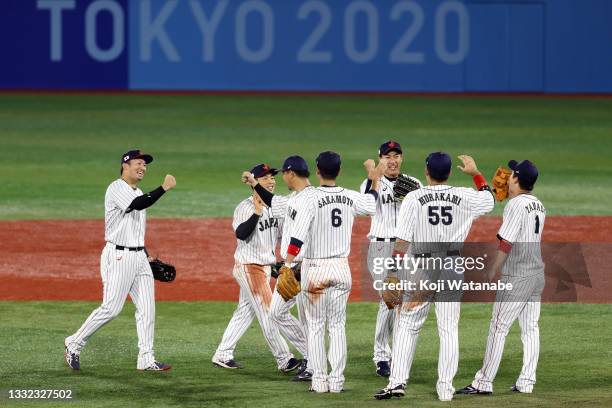 Team Japan celebrates after defeating Team Republic of Korea 5-2 during the semifinals of men's baseball on day twelve of the Tokyo 2020 Olympic...