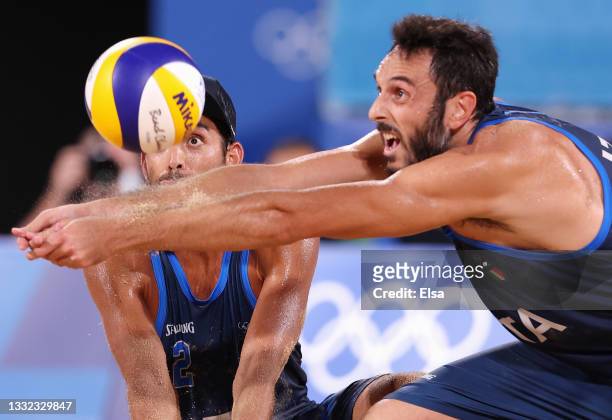Paolo Nicolai and Daniele Lupo of Team Italy compete against Team Qatar during the Men's Quarterfinal beach volleyball on day twelve of the Tokyo...