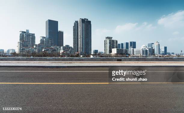 empty urban asphalt road - cityscape stock pictures, royalty-free photos & images