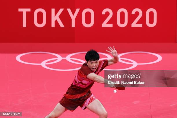 Harimoto Tomokazu of Team Japan reacts during his Men's Team Semifinals table tennis on day twelve of the Tokyo 2020 Olympic Games at Tokyo...