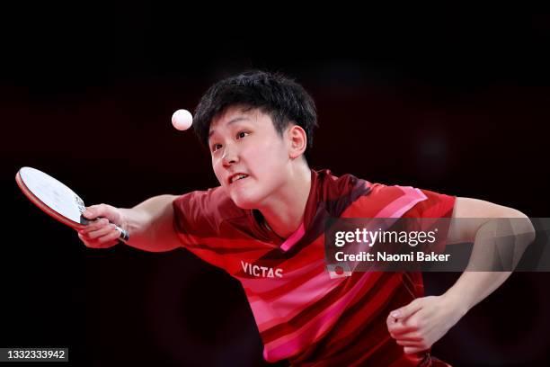 Harimoto Tomokazu of Team Japan serves during his Men's Team Semifinals table tennis match on day twelve of the Tokyo 2020 Olympic Games at Tokyo...