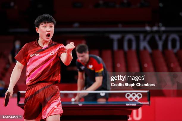 Harimoto Tomokazu of Team Japan reacts during his Men's Team Semifinals table tennis match on day twelve of the Tokyo 2020 Olympic Games at Tokyo...