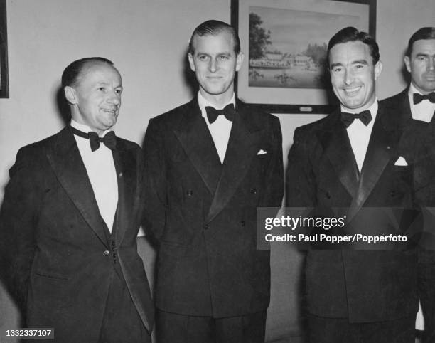 Prince Philip, Duke of Edinburgh attends a cricket writers club dinner with Australian cricketer Don Bradman , on left, and English cricketer Denis...