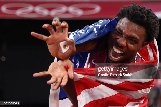 Noah Lyles of Team United States celebrates after winning the bronze medal in the Men's 200m Final on day twelve of the Tokyo 2020 Olympic Games at...