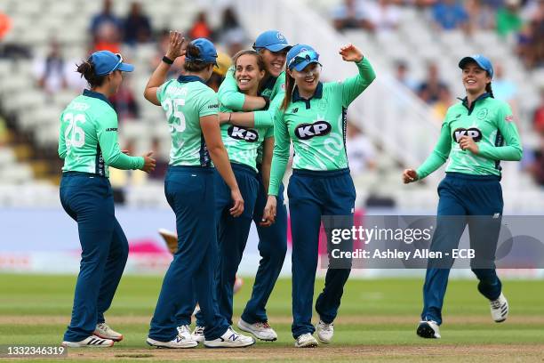 Tash Farrant of Oval Invincibles celebrates a wicket with teammates during The Hundred match between Birmingham Phoenix Women and Oval Invincibles...