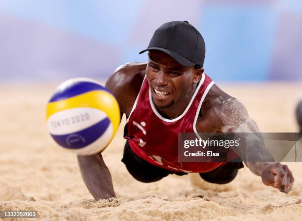 Ahmed Tijan of Team Qatar react dives for a ball against Team Italy during the Men's Quarterfinal beach volleyball on day twelve of the Tokyo 2020...