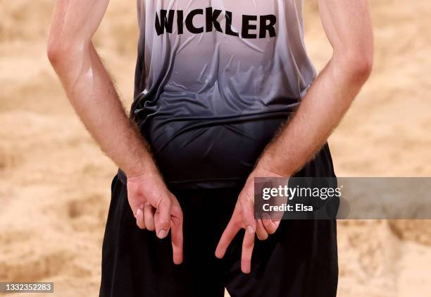 Clemens Wickler of Team Germany signals the play against Team ROC during the Men's Quarterfinal beach volleyball on day twelve of the Tokyo 2020...