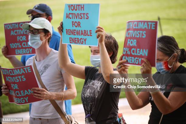 Young climate activists and their supporters rally on the National Mall on August 04, 2021 in Washington, DC. Organized by the Chesapeake Climate...