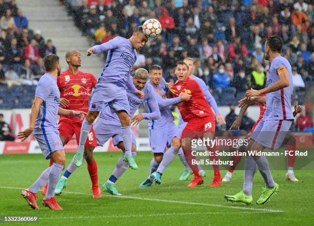 Sergino Dest of FC Barcelona heads the ball during the friendly match between FC Red Bull Salzburg and FC Barcelona at Red Bull Arena on August 04,...