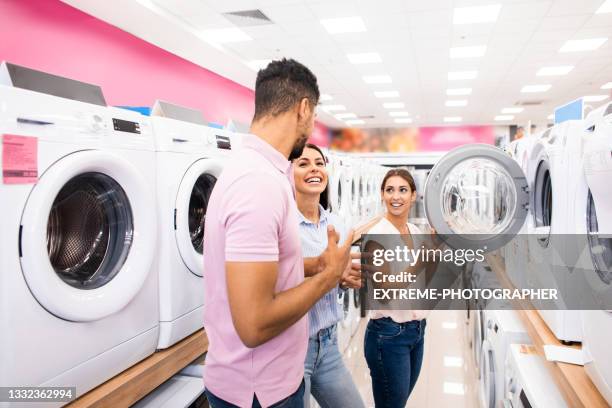 customer service during retail - buying washing machine stock pictures, royalty-free photos & images