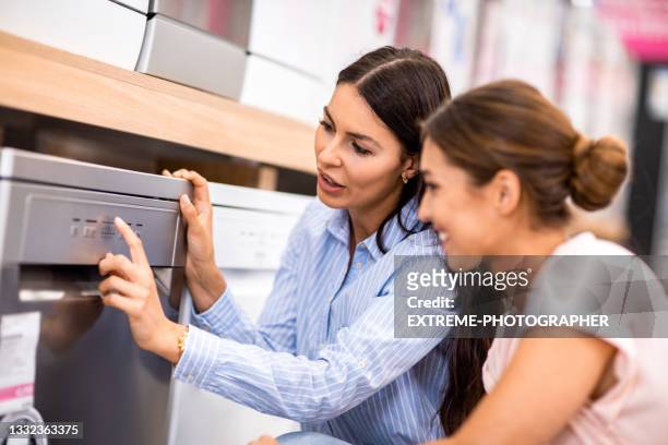 choosing the best dishwasher - mall home appliance stock pictures, royalty-free photos & images