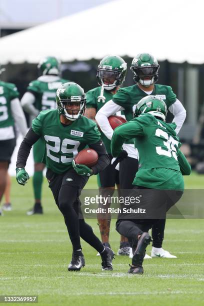 Lamarcus Joyner and "nSharrod Neasman of the New York Jets work out during a morning practice at Atlantic Health Jets Training Center on July 29,...