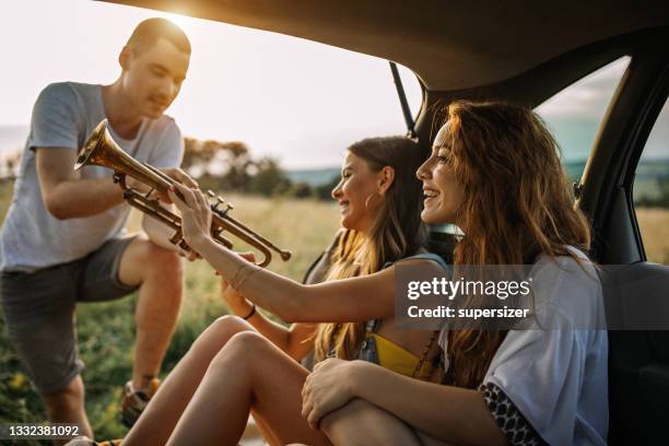 friends - trumpet stock pictures, royalty-free photos & images