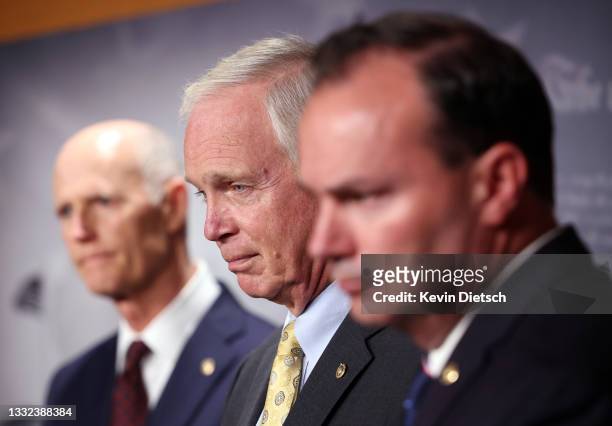 Sen. Rick Scott , Sen. Ron Johnson and Sen. Mike Lee attend a press conference on the bipartisan infrastructure bill at U.S. Capitol on August 04,...