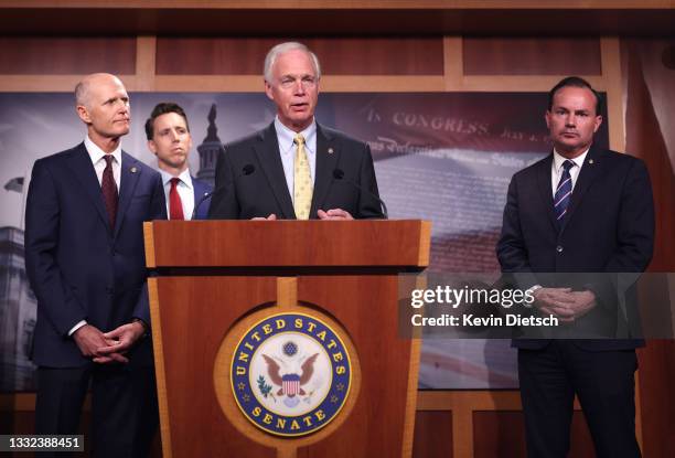 Sen. Ron Johnson speaks on the bipartisan infrastructure bill as he is joined by Sen. Rick Scott , Sen Josh Hawley and Sen. Mike Lee , during a press...