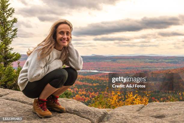 portrait of a woman with forest during autumn. - long weekend canada stock pictures, royalty-free photos & images