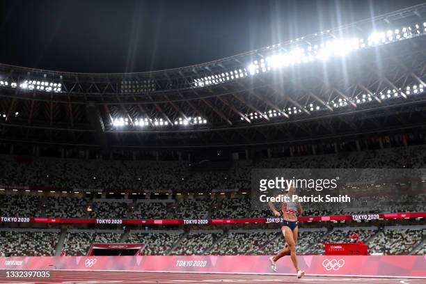 Katarina Johnson-Thompson of Team Great Britain limps towards the finish line in the Women's Heptathlon 200m on day twelve of the Tokyo 2020 Olympic...
