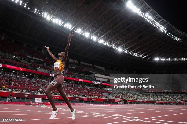 Peruth Chemutai of Team Uganda celebrates after winning the gold medal in the Women's 3000m Steeplechase Final on day twelve of the Tokyo 2020...