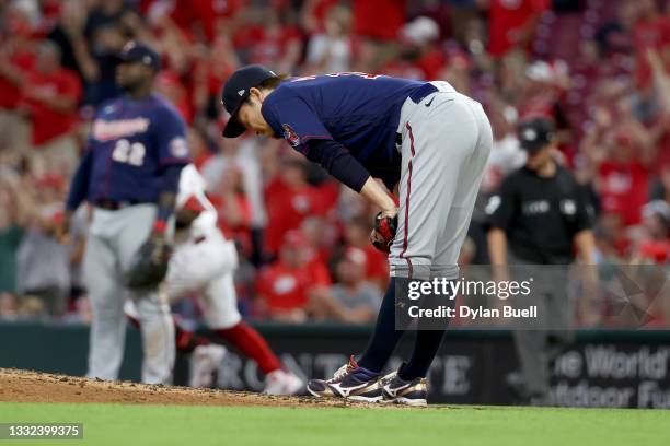 Kenta Maeda of the Minnesota Twins reacts after giving up a home run to Jonathan India of the Cincinnati Reds in the fifth inning at Great American...