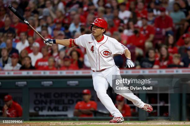Shogo Akiyama of the Cincinnati Reds hits a single in the fifth inning against the Minnesota Twins at Great American Ball Park on August 03, 2021 in...