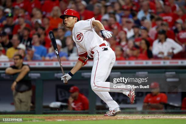 Shogo Akiyama of the Cincinnati Reds hits a single in the fifth inning against the Minnesota Twins at Great American Ball Park on August 03, 2021 in...