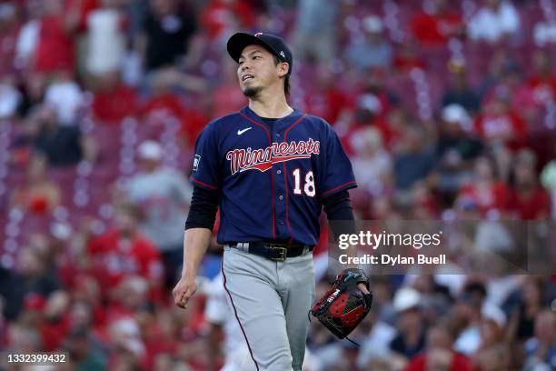 Kenta Maeda of the Minnesota Twins reacts after giving up a double to Jesse Winker of the Cincinnati Reds in the third inning at Great American Ball...