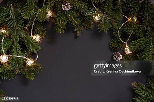 christmas fir tree on wooden board background with copy space - rolling pin photos et images de collection