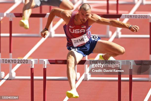 Zachery Ziemek of Team United States competes in the Men's Decathlon 110m Hurdles heats on day thirteen of the Tokyo 2020 Olympic Games at Olympic...