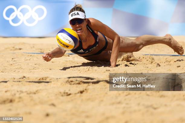 Alix Klineman of Team United States dives for the ball against Team Switzerland during the Women's Semifinal beach volleyball on day thirteen of the...