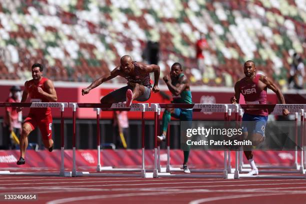 Damian Warner of Team Canada competes in the Men's Decathlon 110m Hurdles heats on day thirteen of the Tokyo 2020 Olympic Games at Olympic Stadium on...