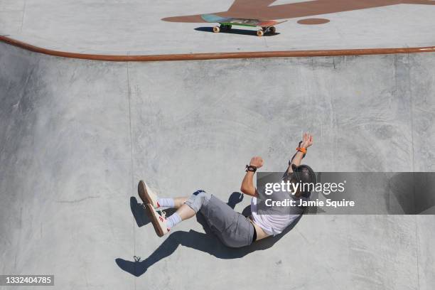 Andy Anderson of Team Canada crashes during the Men's Skateboarding Park Preliminary Heat 1 on day thirteen of the Tokyo 2020 Olympic Games at Ariake...