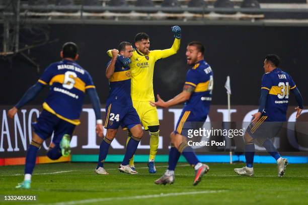 Agustín Rossi of Boca Juniors celebrates with teammates winning in the shootout after a round of sixteen match of Copa Argentina 2021 between Boca...