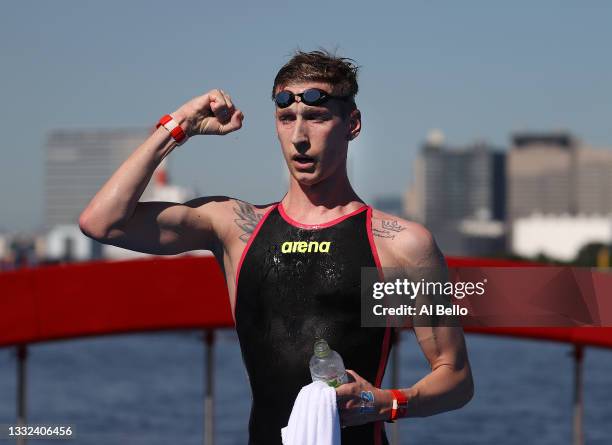 Florian Wellbrock of Team Germany reacts after winning Gold in the Men's 10km Marathon Swimming on day thirteen of the Tokyo 2020 Olympic Games at...