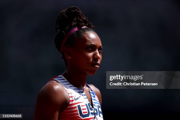 Javianne Oliver of Team United States looks up prior to competing in round one of the Women's 4 x 100m Relay heats on day thirteen of the Tokyo 2020...