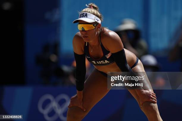 April Ross of Team United States looks on against Team Switzerland during the Women's Semifinal beach volleyball on day thirteen of the Tokyo 2020...