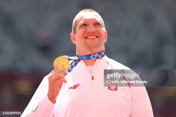 Gold medalist Wojciech Nowicki of Team Poland poses during the medal ceremony for the Men's Hammer Throw Final on day thirteen of the Tokyo 2020...