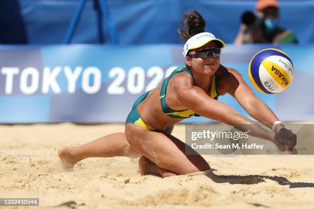 Mariafe Artacho del Solar of Team Australia dives for the ball against Team Latvia during the Women's Semifinal beach volleyball on day thirteen of...