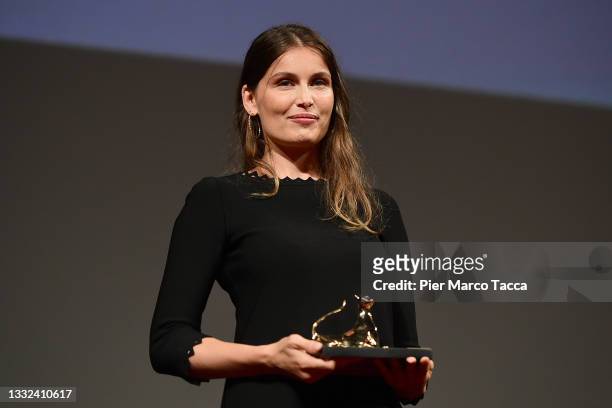 Actress Laetitia Casta is awarded the Davide Campari Opening Ceremony Excellence Award during the 74th Locarno Film Festival on August 04, 2021 in...