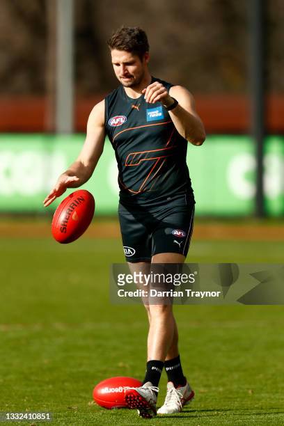 Jesse Hogan of the Giants kicks the ball during a Greater Western Sydney Giants AFL training session at Holden Centre on August 05, 2021 in...