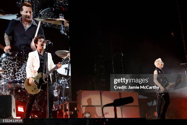 Billie Joe Armstrong, Mike Dirnt and Tre Cool of Green Day perform during The Hella Mega Tour at Citi Field on August 04, 2021 in New York City.