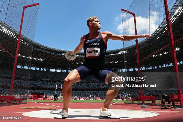 Kevin Mayer of Team France competes in the Men's Decathlon Discus Throw on day thirteen of the Tokyo 2020 Olympic Games at Olympic Stadium on August...