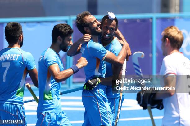 Harmanpreet Singh of Team India celebrates scoring their third goal with teammates during the Men's Bronze medal match between Germany and India on...