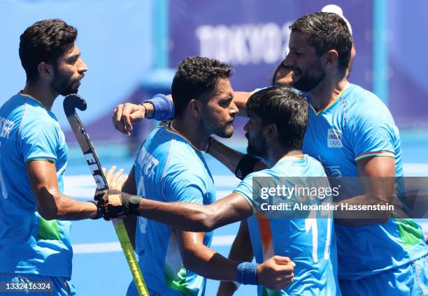 Harmanpreet Singh of Team India celebrates scoring their third goal with teammates during the Men's Bronze medal match between Germany and India on...