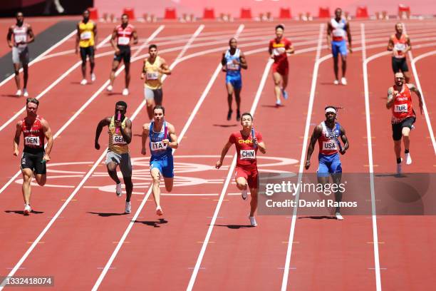 Athletes compete in round one of the Men's 4 x 100m Relay heats on day thirteen of the Tokyo 2020 Olympic Games at Olympic Stadium on August 05, 2021...