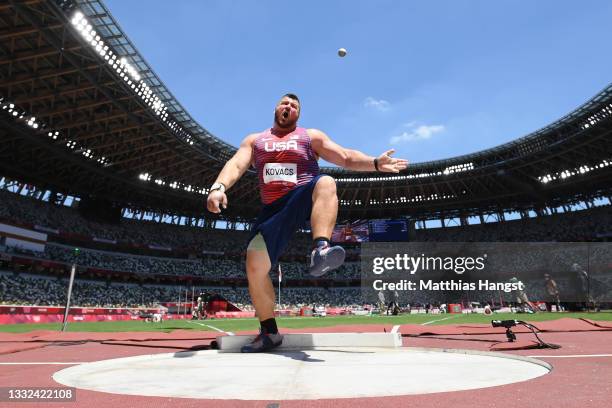 Joe Kovacs of Team United States reacts while competing in the Men's Shot Put Final on day thirteen of the Tokyo 2020 Olympic Games at Olympic...