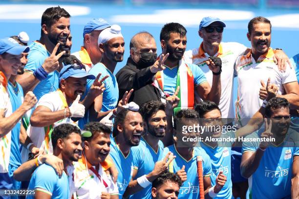 President Narinder Dhruv Batra and Team India pose for a picture after India won the Men's Bronze medal match between Germany and India on day...