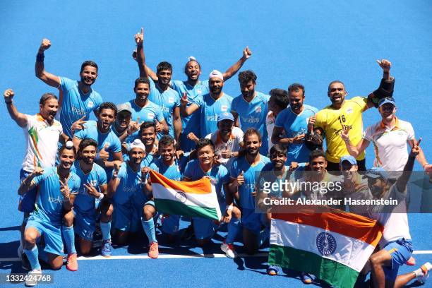 Team India pose for a picture after winning the Men's Bronze medal match between Germany and India on day thirteen of the Tokyo 2020 Olympic Games at...