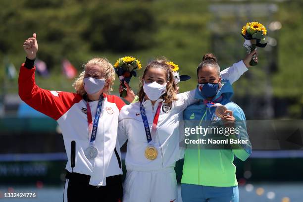 Silver medalist Laurence Vincent-Lapointe of Team Canada, gold medalist Nevin Harrison of Team United States and bronze medalist Liudmyla Luzan of...