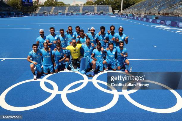 Team India poses for a picture after winning the Men's Bronze medal match between Germany and India on day thirteen of the Tokyo 2020 Olympic Games...