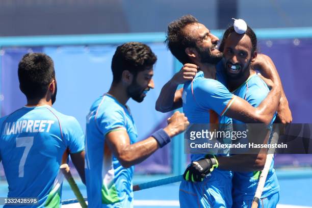 Harmanpreet Singh of Team India celebrates scoring their third goal with teammates during the Men's Bronze medal match between Germany and India on...